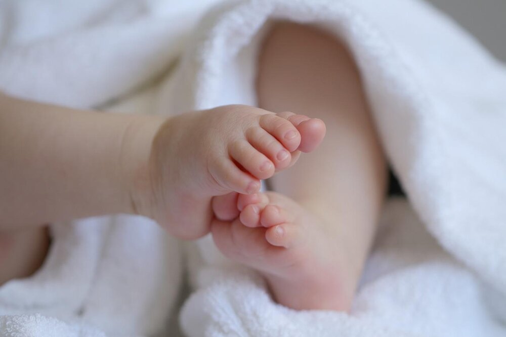 Foto kleiner Babybeinchen