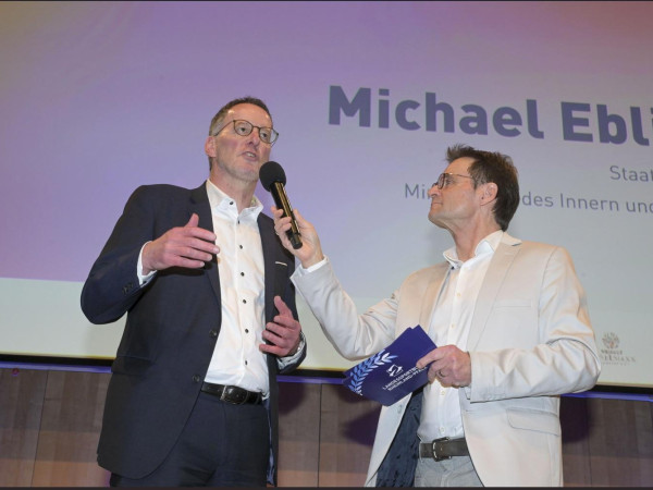 Innenminister Michael Ebling und Moderator Christian Döring